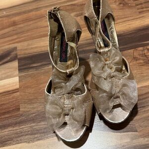 Material Girl Shimmering Gold Heels with Sheer Bow